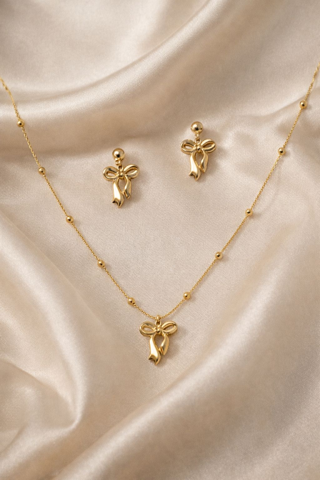 Golden Bow Pendant Necklace & Earrings Set – Stainless Steel